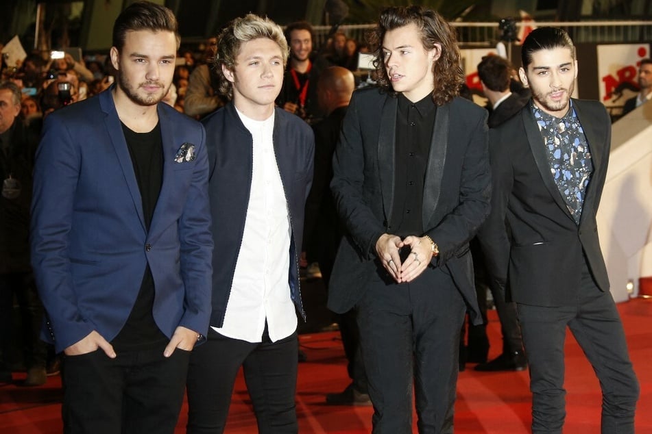 (From l. to r.:) Liam Payne, Niall Horan, Louis Tomlinson and Zayn Malik pose on the red carpet at the 16th Annual NRJ Music Awards in December 2014. Malik left the group the following year.