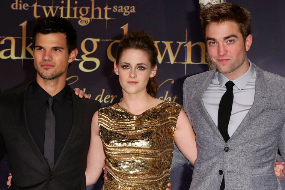 Many Twilight fans argue that the movie franchise's leading actors (from l to r) Taylor Lautner, Kristen Stewart, and Robert Pattinson cannot be replaced.