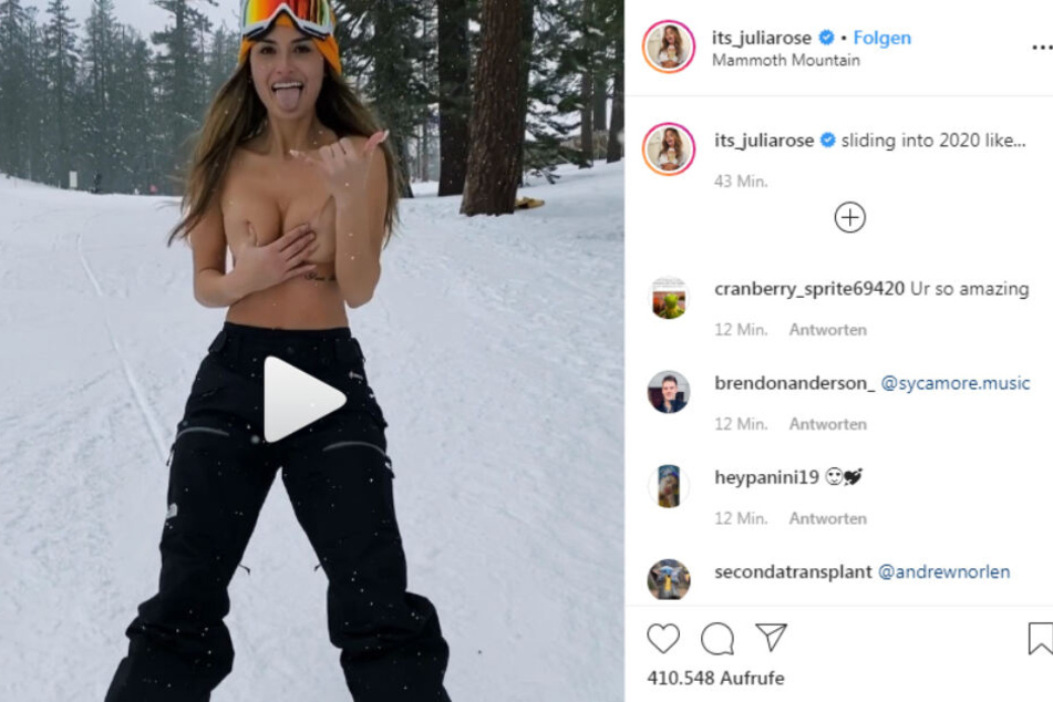 Julia Rose grüßt vom Snowboard.