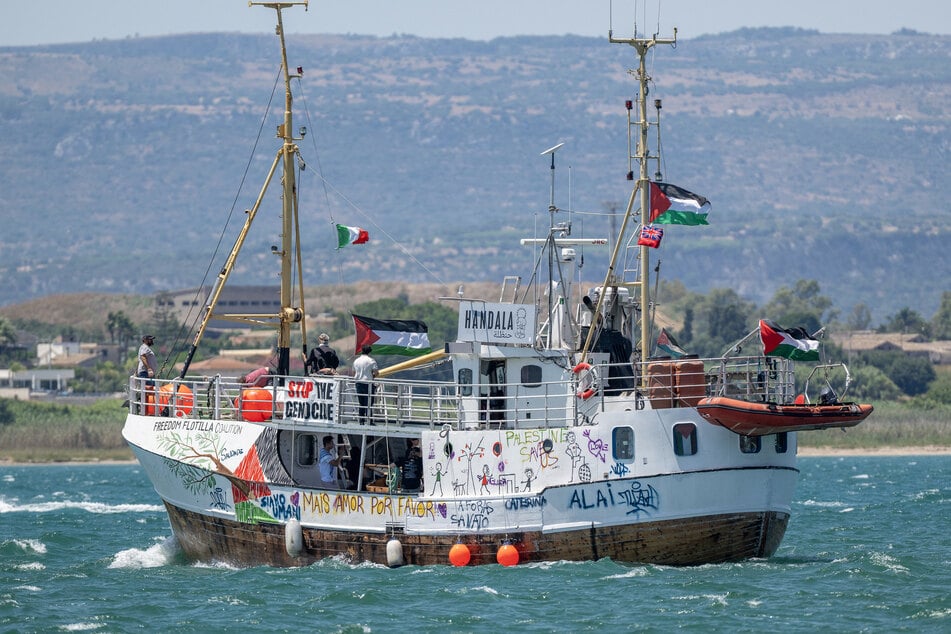 The Freedom Flotilla ship "Handala" is pictured as it leaves for Gaza at a port in Syracuse, Sicily, southern Italy, on July 13, 2025.