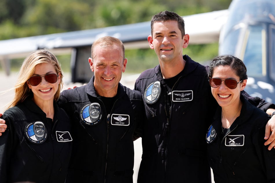 From l. to r.: Anna Menon, Scott Poteet, Jared Isaacman, and Sarah Gillis, crew members of Polaris Dawn, attend a press conference at the Kennedy Space Center in Cape Canaveral, Florida.