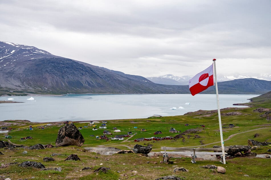 Greenland's flag flies in Igaliku settlement in the Kujalleq municipality in southern Greenland.