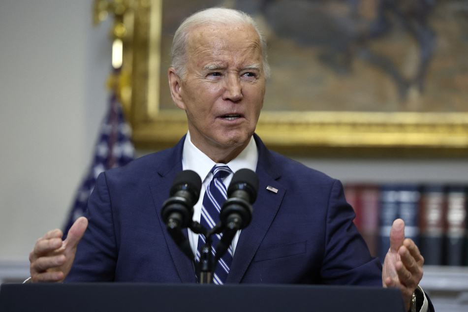 President Joe Biden delivers remarks on the reported death of Alexei Navalny from the Roosevelt Room of the White House on Friday in Washington, DC.