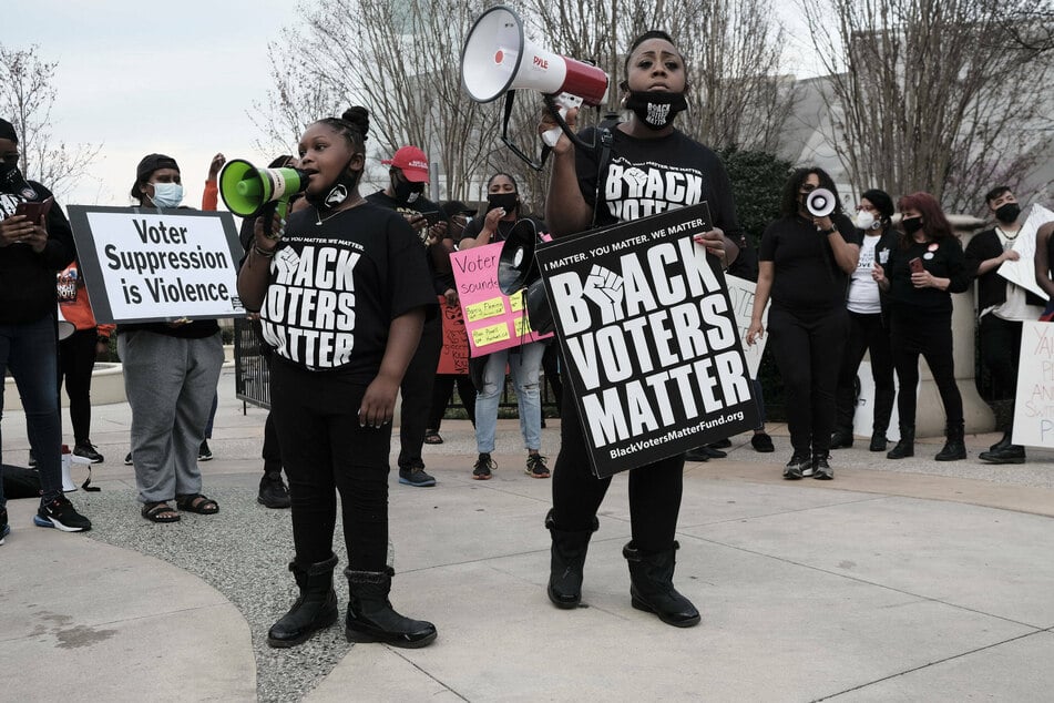 Voter suppression tactics disproportionately disenfranchise Black Americans and other citizens of color.
