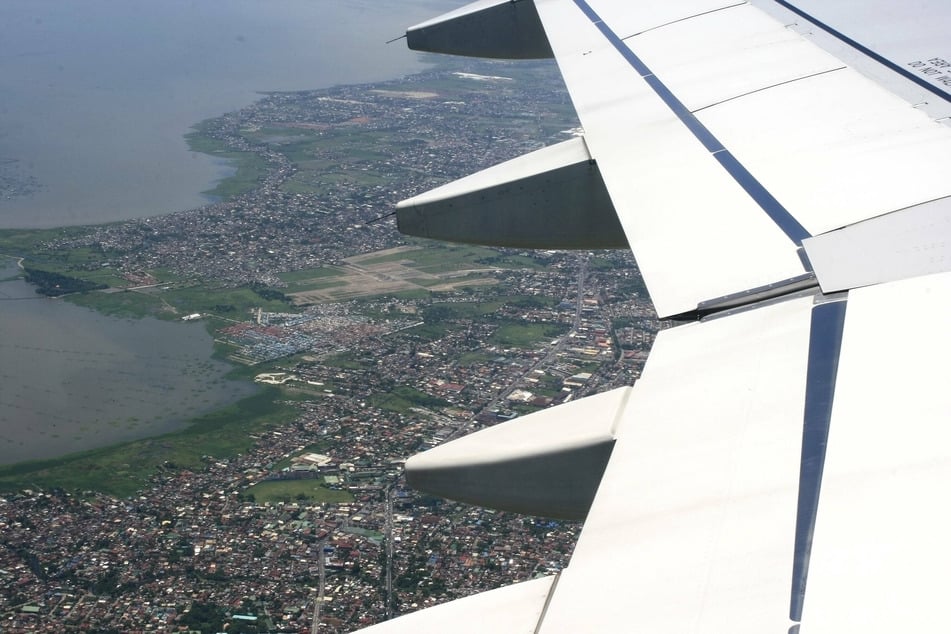 An airplane offers a bird's-eye view of the Philippine capital of Manila.