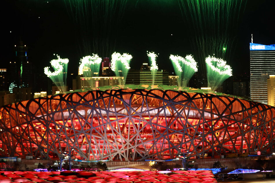 Fireworks illuminate the night sky during the opening ceremony of the Beijing 2022 Olympic Winter games.