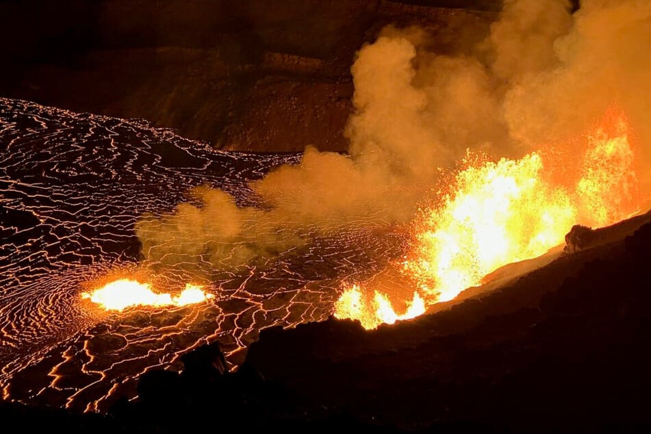 Hawaii's Kilauea volcano spews fresh lava as it nears year-long eruption