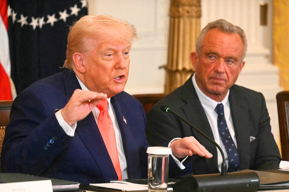 During a press conference with Health and Human Services (HHS) Secretary Robert F. Kennedy Jr. (r.) on Thursday, President Donald Trump (l.) said he believes the rise of autism in the US is "artificially induced."