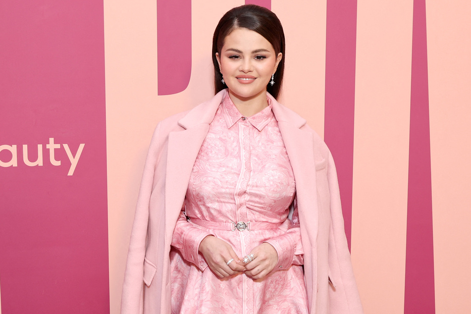 Selena Gomez rocked an all-pink ensemble for the launch of Rare Beauty's new powder blush.