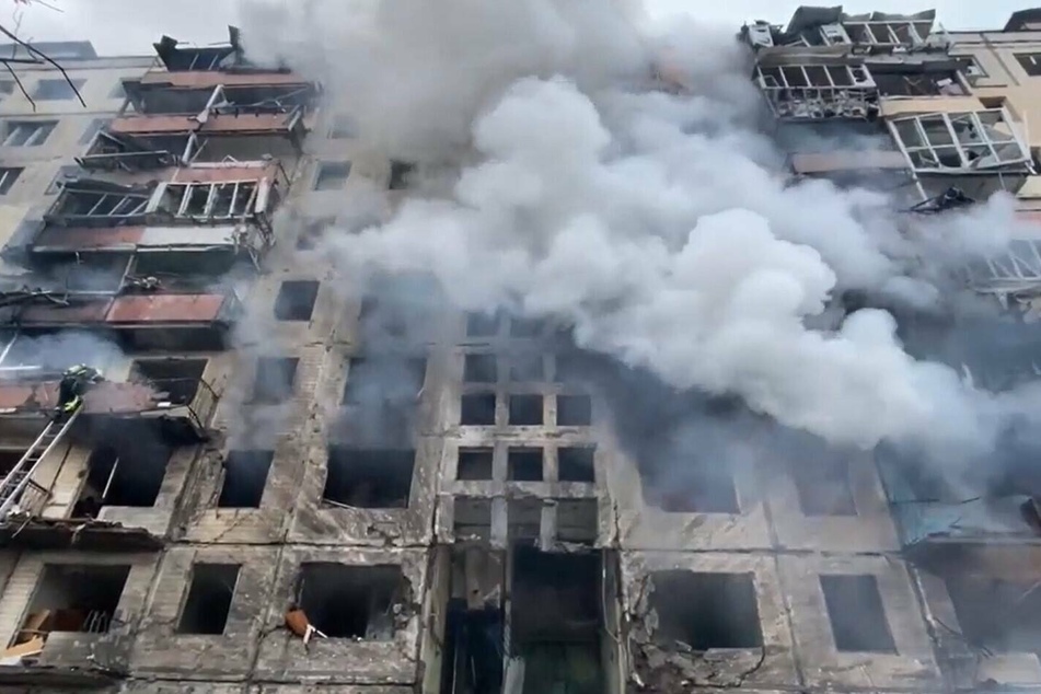 The aftermath of the Russian shelling of a residential building in Obolonsky district, Kyiv, on Monday morning.