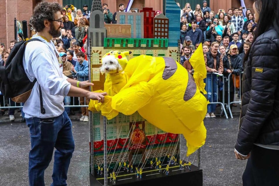 This iconic pup nabbed second place in the costume contest for their amazing Pikachu Macy's Day Thanksgiving Day Parade float costume. How New York can you get?!
