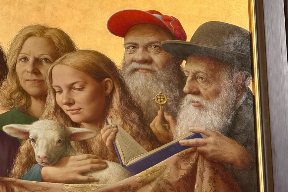 Der Ausschnitt des Cranach-Triegel-Altars zeigt den erfrorenen Obdachlosen Burkhard Scheffler (rote Basketballmütze) als Petrus.