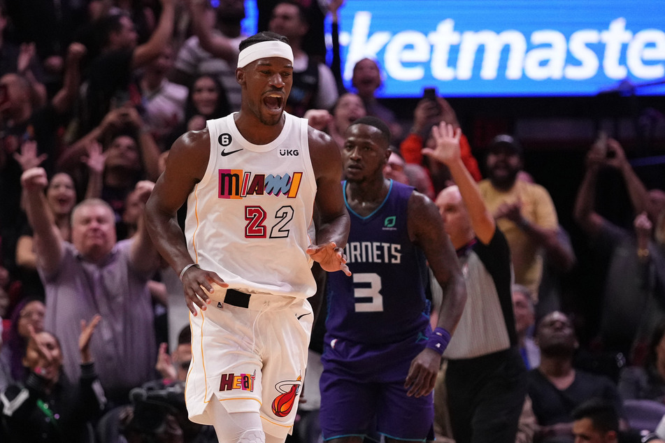 Miami Heat forward Jimmy Butler reacts after making a shot against the Charlotte Hornets during the second half at FTX Arena.