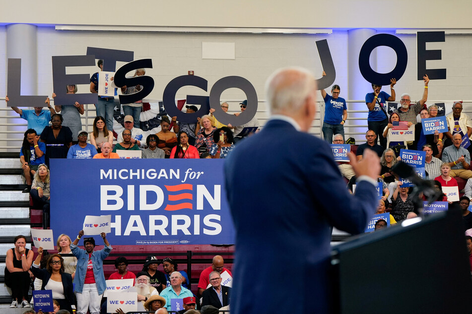 Biden also blasted Trump and promised he was "OK" as supporters cheered and urged him not to quit.