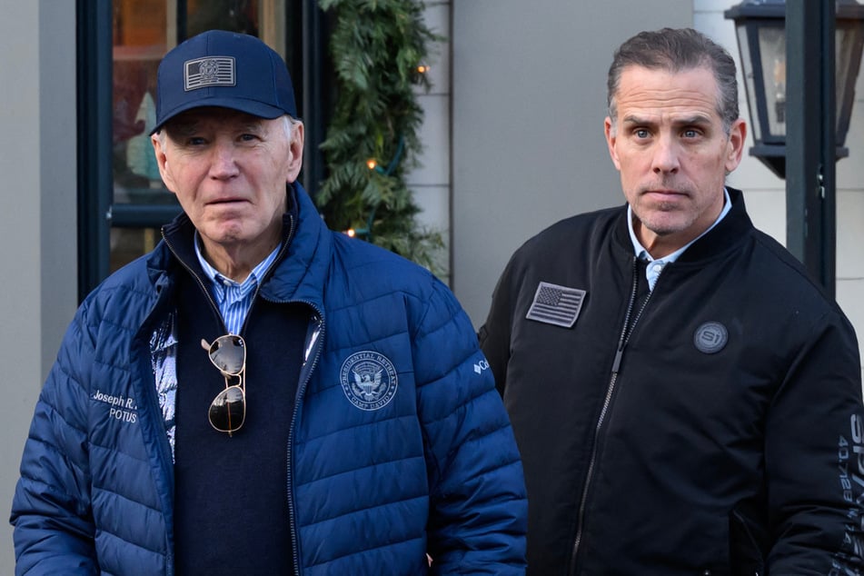 A November 29, 2024 photo shows US President Joe Biden (l.) and son Hunter Biden (r.) stepping out of a bookstore while shopping in Nantucket, Massachusetts.