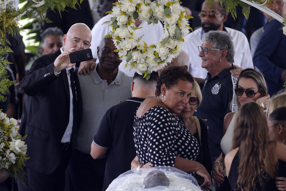 FIFA president Gianni Infantino has been widely criticized on social media for taking a selfie near Pelé's coffin.