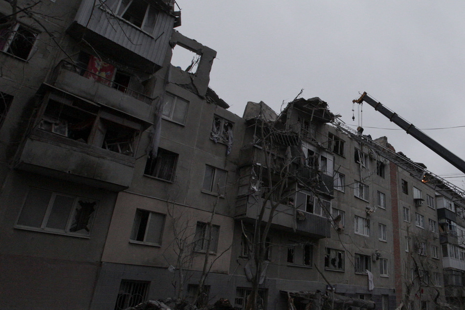 Ukraine mourns victims of Russian missile strike on residential building