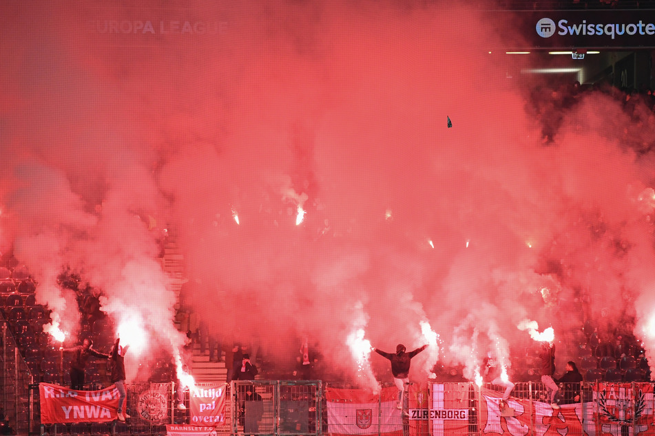 With their use of pyrotechnics and firecrackers, both fan camps don't exactly cover themselves in glory.