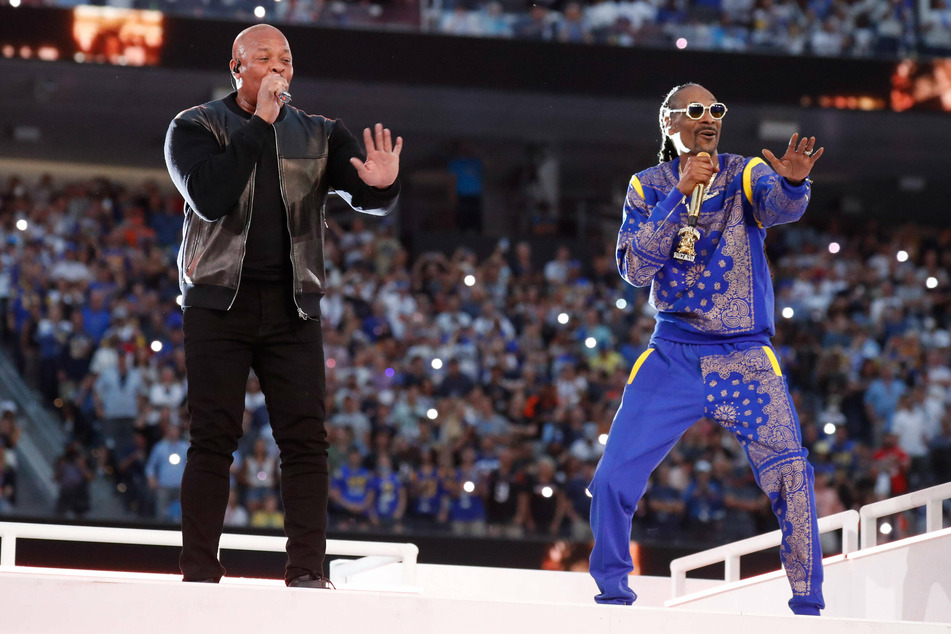 Musicians Dr. Dre (l) and Snoop Dogg performing during the Super Bowl LVI Halftime Show.