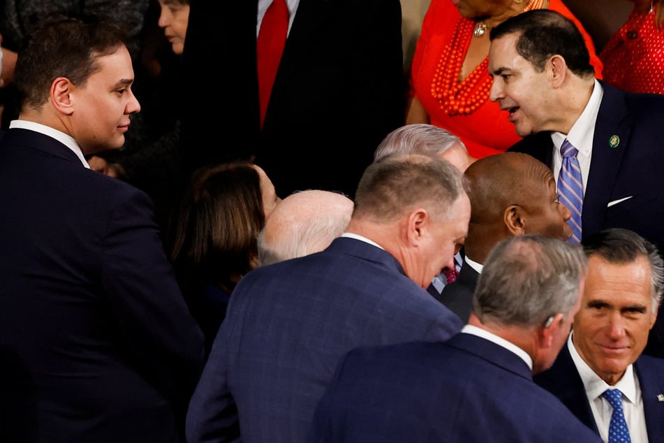 George Santos was called "one sick puppy" by Utah Senator Mitt Romney (bottom, r.)