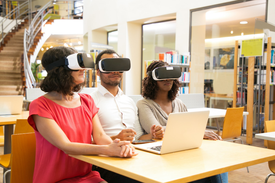 Colleagues may soon be able to "see" co-workers who are in a different location as if they were in the same room (stock image).