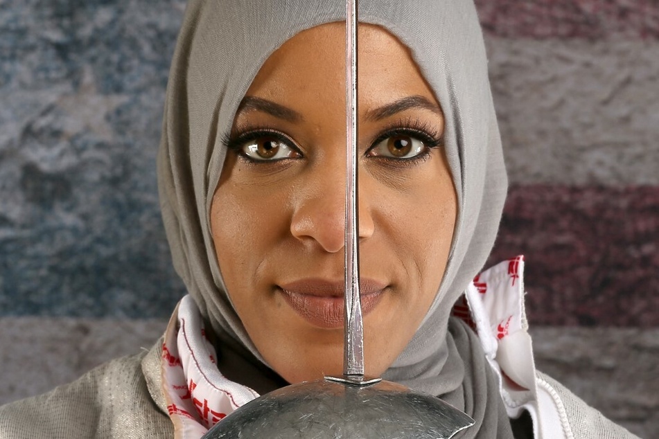 US Olympic Medalist Ibtihaj Muhammad broke barriers for women who wear hijabs during competition.