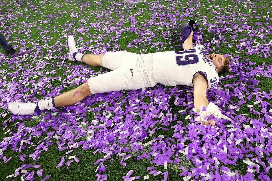 Matthew Kerr #39 of the TCU Horned Frogs celebrates after defeating the Michigan Wolverines in the Fiesta Bowl and earning the chance to play for a national title for the first time in TCU history since 1938.