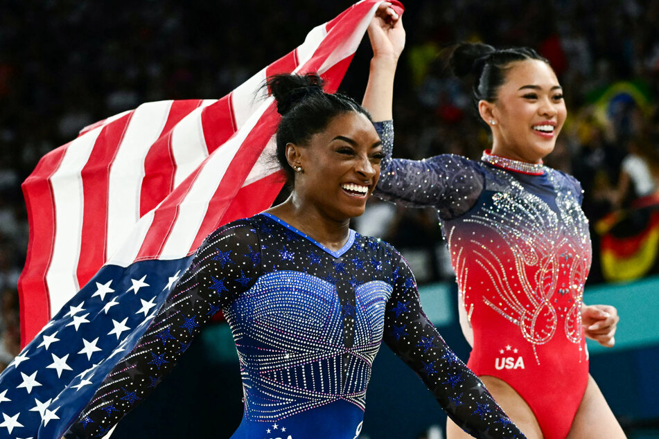 Defending champ Suni Lee (r.) took home the bronze as Simone Biles scored another gold at the individual all-around in Paris.