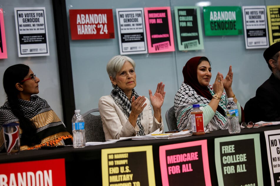 Green Party presidential nominee Dr. Jill Stein (c.) attends a rally in Dearborn, Michigan, organized with Abandon Harris and Workers Strike Back.