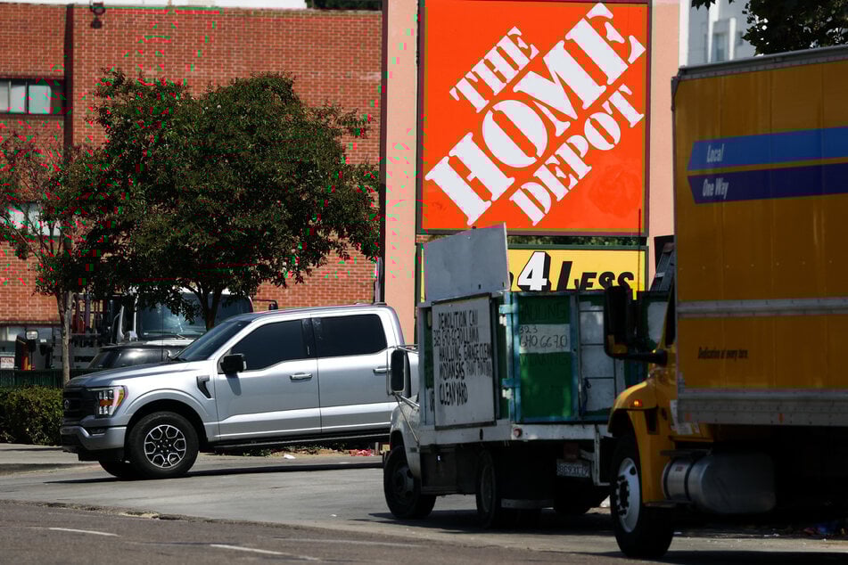 The Home Depot logo is displayed outside a store on Wilshire Blvd that was previously the site of immigration arrests of day laborers during "Operation Trojan Horse" in Los Angeles, California, on August 6, 2025.