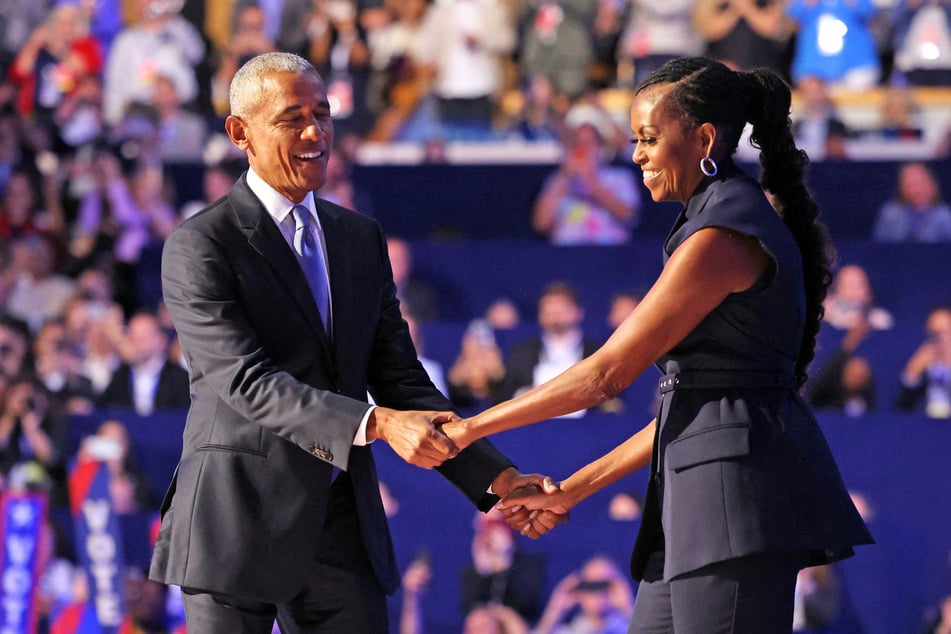 Barack and Michelle Obama (r.) recently announced they are co-producing a revival of the hit Broadway Proof through their Higher Grounds production company.