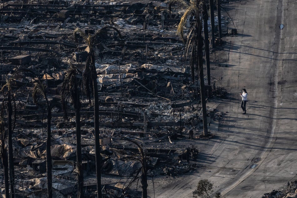 The remains of homes destroyed by the Palisades Fire are pictured in the Pacific Palisades neighborhood in Los Angeles, California, on January 11, 2025.