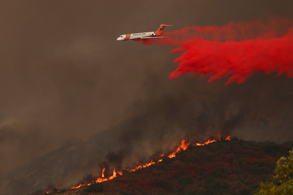 The fast-moving Airport Fire in Orange County has consumed more than 9,000 acres since it was started accidentally on Monday afternoon by workers operating heavy equipment.