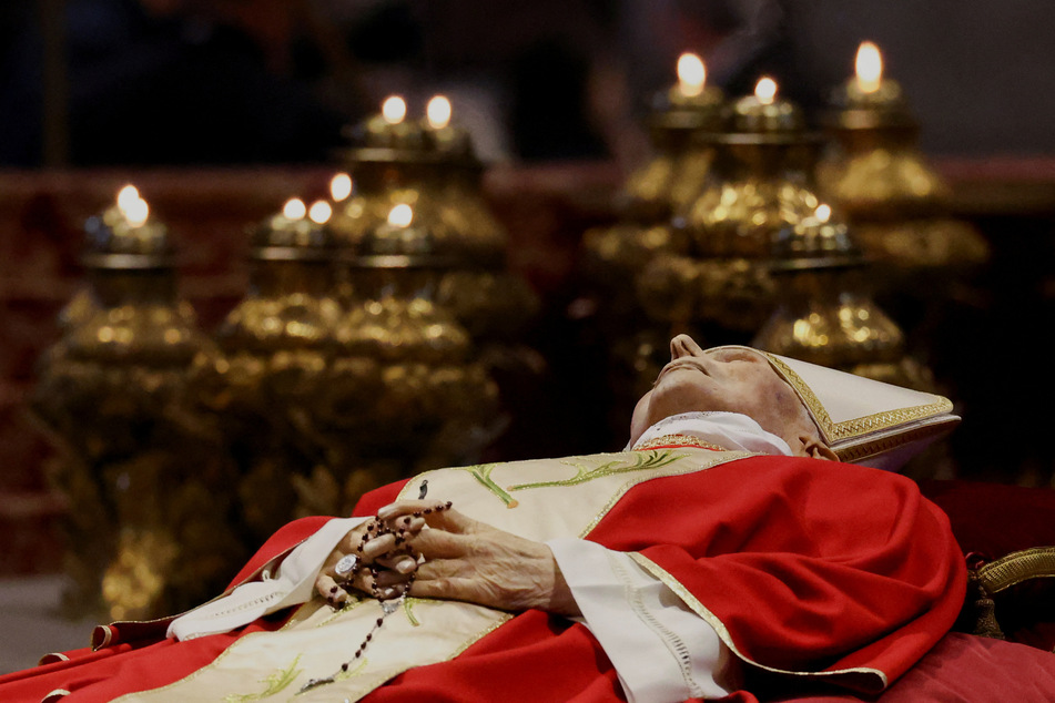The body of former Pope Benedict XVI lies in St. Peter's Basilica at the Vatican on January 2, 2023.