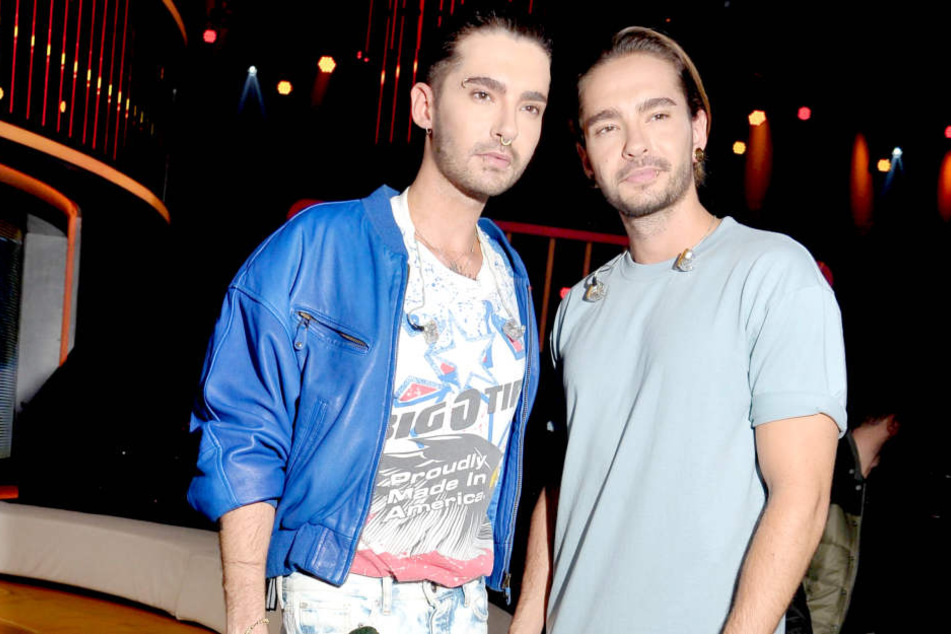 Gerade wurde sie beim Knutschen mit Bill Kaulitz' (28, l.) Zwillingsbruder Tom erwischt.