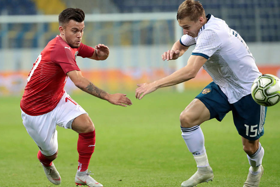 In einem knappen Duell setzte sich der Österreicher Sascha Horvath (l.) gegen Russlands "U21" durch. So wie hier gegen Mikhail Lysov.