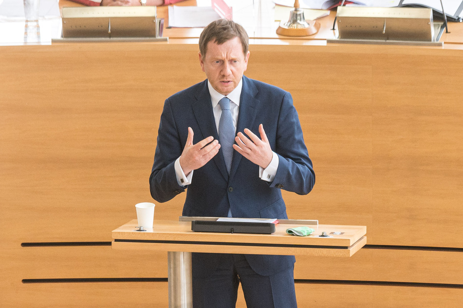 Der Herr der Lage: Michael Kretschmer (44, CDU).