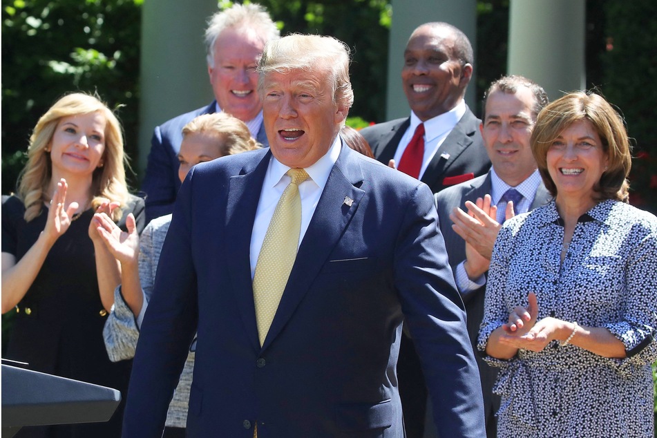 Donald Trump reacts to having the song Happy Birthday sung to him before giving a speech in the Rose Garden of the White House on June 14, 2019.