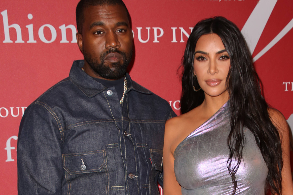 Kim Kardashian (l) with Kanye West (r) at the Fashion Group International Night of Stars Gala in 2019.