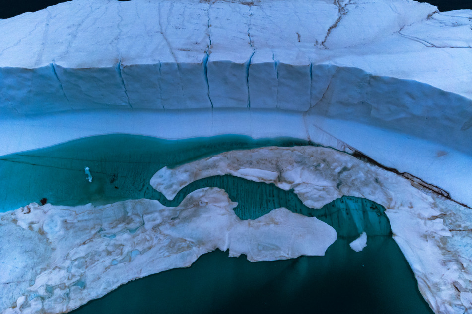 Breaching the global warming limits of the world's climate goals could see the melting of Greenland's ice sheet add more than three feet to rising sea levels.