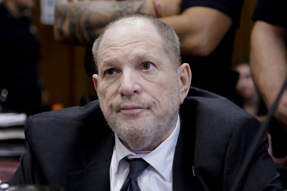 Former film producer Harvey Weinstein appears in court as his retrial continues at Manhattan Criminal Court on Tuesday in New York City. Harvey Weinstein faces a retrial on rape and sex assault charges for which a previous 2017 conviction by a jury was overturned by an appeals court that ruled the way witnesses were handled was unlawful. Leonardo Munoz-Pool/Getty Images/AFP (Photo by POOL / GETTY IMAGES NORTH AMERICA / Getty Images via AFP)