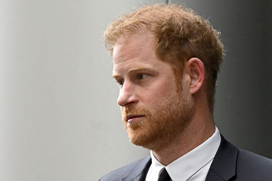 Prince Harry has been threatened by a former stripper who partied with him in Las Vegas over a decade ago.