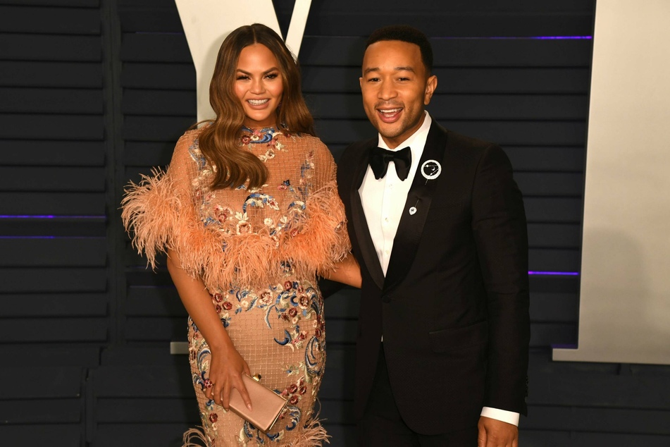 Chrissy Teigen wants to focus on enjoying life more. Featured here with husband John Legend at the Vanity Fair Oscar Party in 2019.