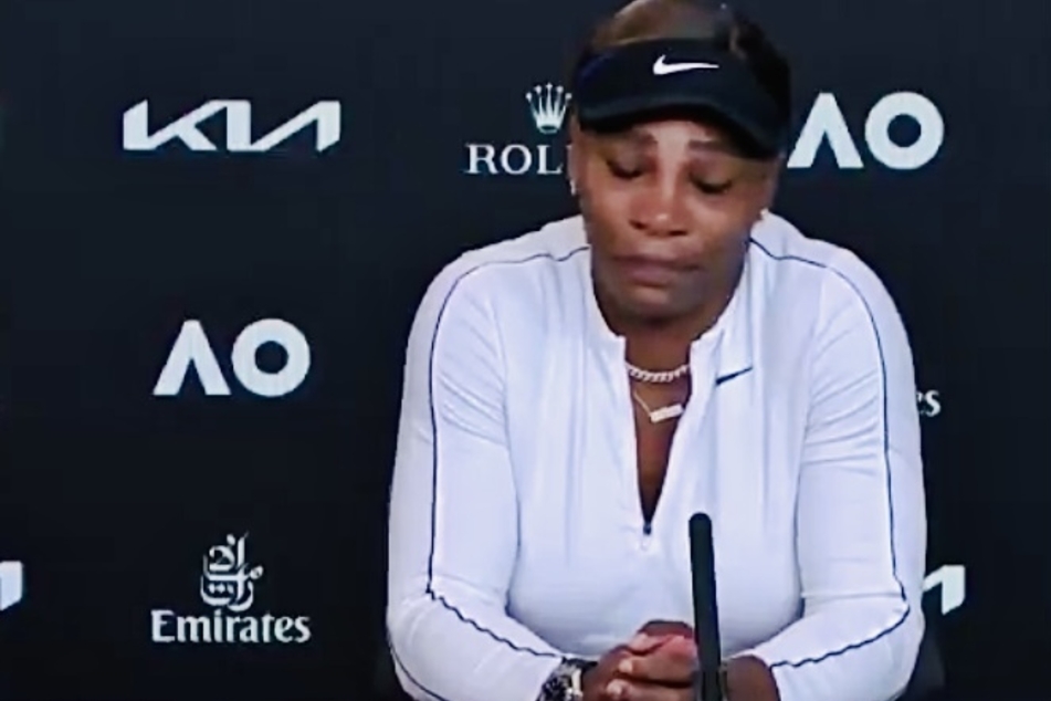 An emotional Serena Williams talks to reporters at an Australian Open press conference.
