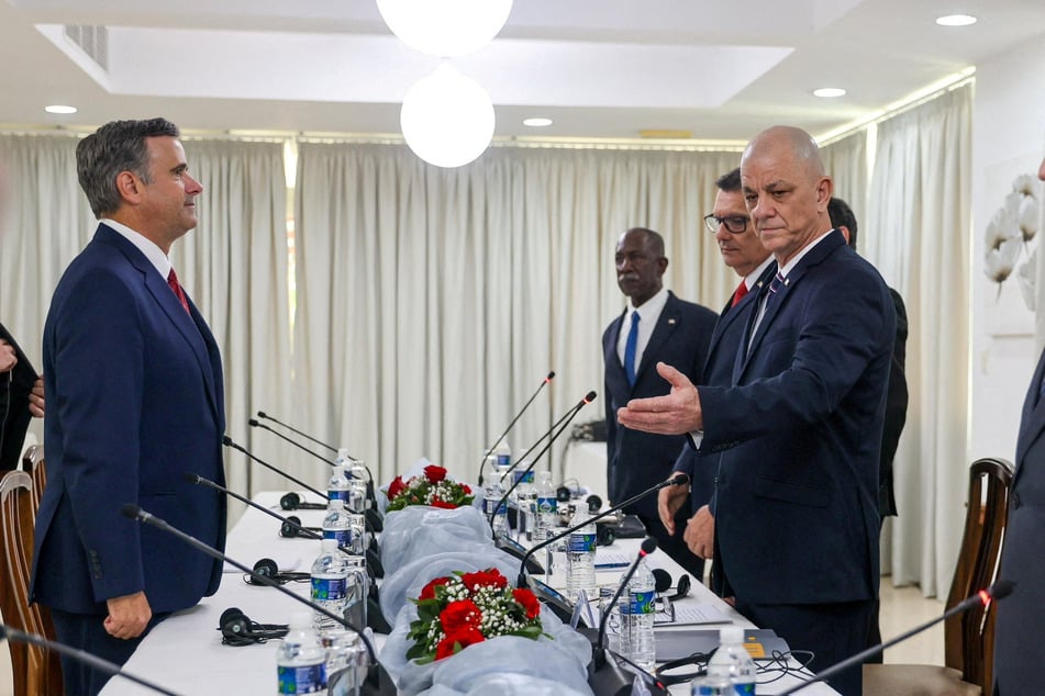 CIA Director John Ratcliffe (l.) attends a meeting with Cuban officials at a location given as Havana in an image released May 14, 2026.