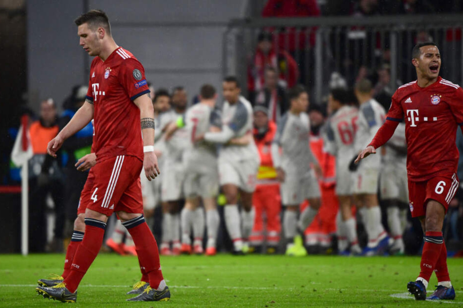 Thiago (r). und Niklas Süle gefrustet nach dem 1:2-Rückstand gegen Liverpool.
