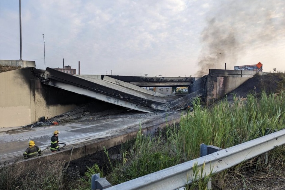 The northbound roadway of the I-95 highway on Cottman Avenue in Tacony, Philadelphia, collapsed due to a truck fire burning on an on-ramp.
