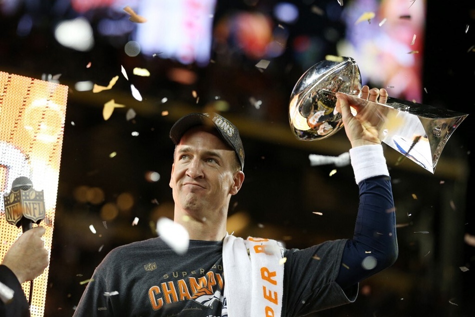 Peyton Manning of the Denver Broncos celebrates with the Vince Lombardi Trophy after Super Bowl 50 at Levi's Stadium.
