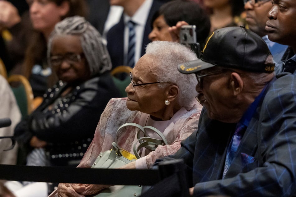 Survivors and siblings Viola Fletcher and Hughes Van Ellis listen as President Biden delivers remarks on the centennial anniversary of the Tulsa race massacre.