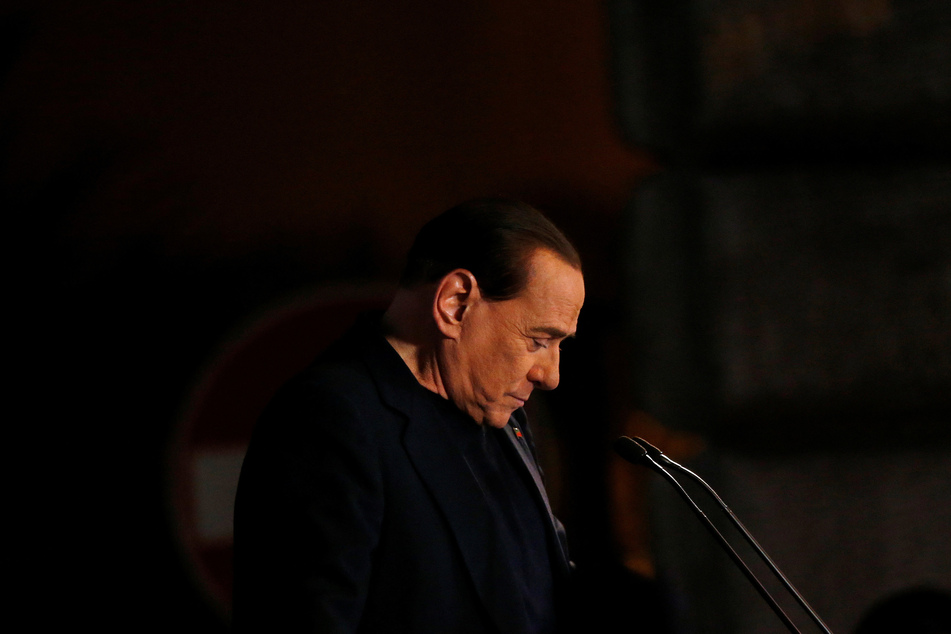 Berlusconi was banned from public office until 2018 after being found guilty of a large tax scam.